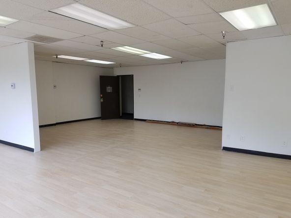 LARGE OPEN ROOM WITH NATURAL LIGHT. GREAT SPACE FOR WORK STATIONS.